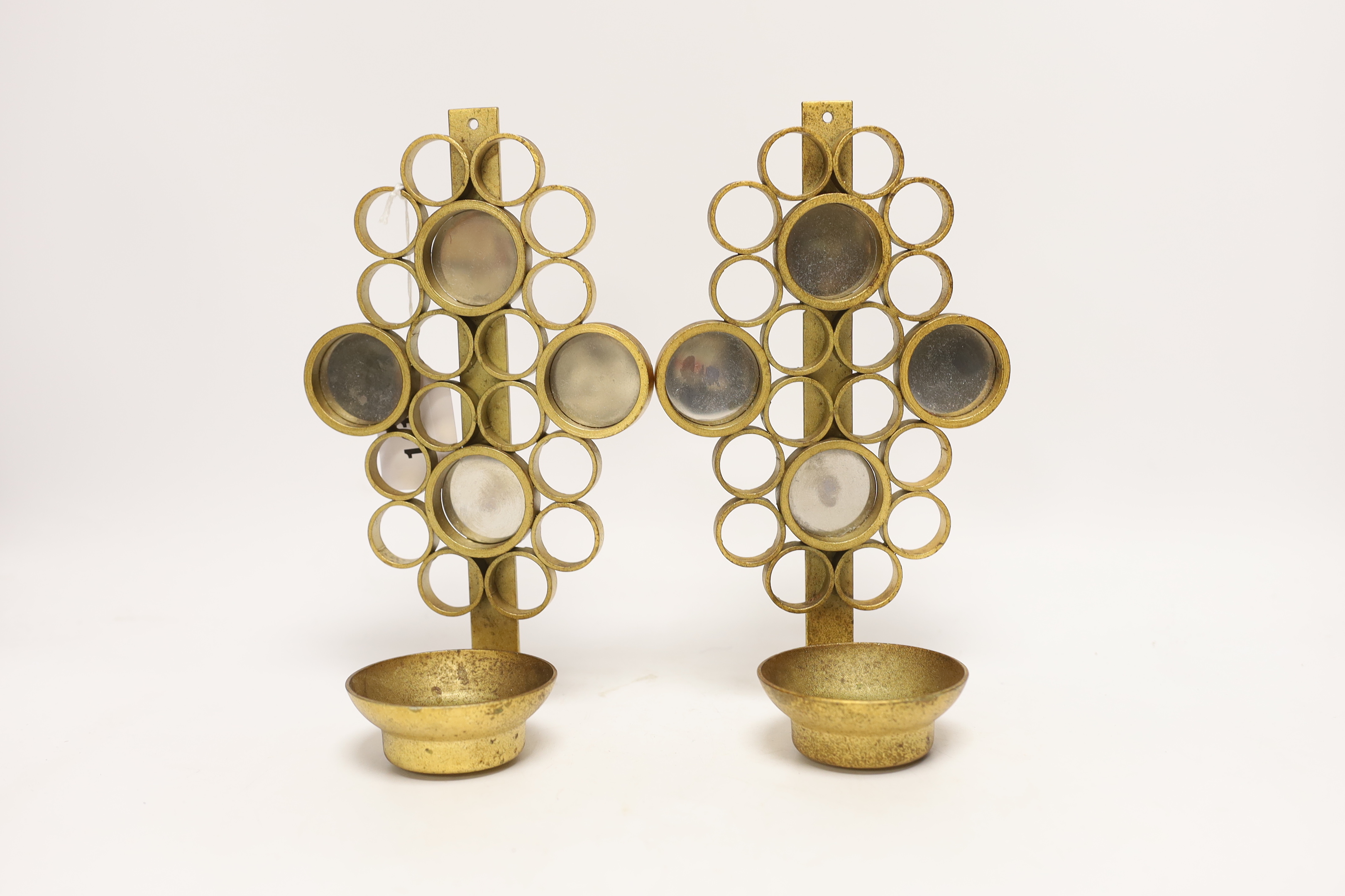 A pair of 1960's mirrored and gilt metal wall sconces, 35cm high